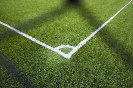 Green artificial turf football field