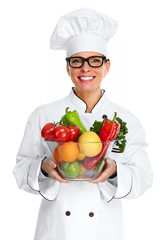 Chef woman with vegetables.