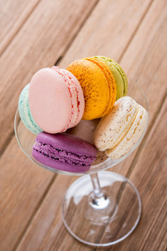 mix macaronin the matini glass on the wooden table
