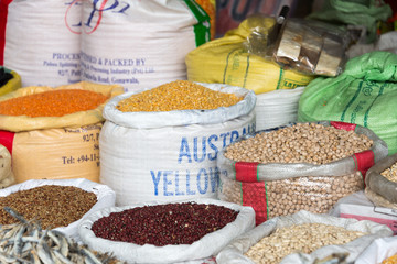 sacks of spices and staple food on food market in colombo, sri lanka