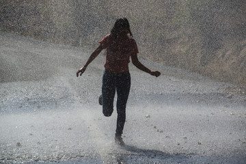 girl running in the rain
