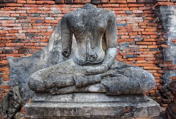 Old headless broken buddha statue at Ayutthaya Thailand