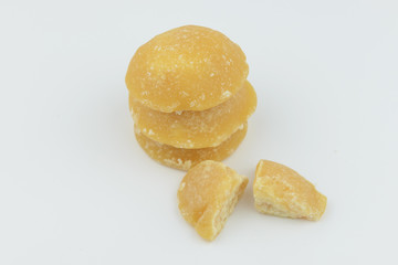 lump of palm sugar, jaggery, isolate background