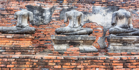 Old headless broken buddha statue at Ayutthaya Thailand