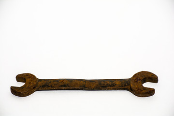 The old rusty metal wrench tools on white background.
