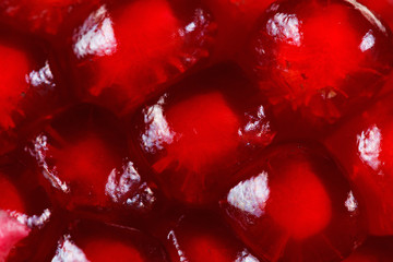 Background of ripe red berries pomegranate, macro.