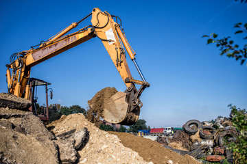 Fototapeta premium construction site digger, excavator and bulldozer. industrial machinery on building site