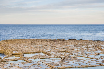 Salt pans near Qbajjar in Gozo, Malta.