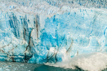 Splash after iceberg fall at Perito Moreno glacier in Patagonia, Argentina