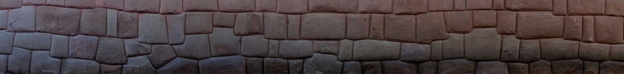 Detail of Inca's perfect stonework. Wall of former palace of Inca Roca in Cuzco, Peru. - obrazy, fototapety, plakaty