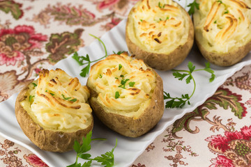 Creamy garlic twice baked potatoes.