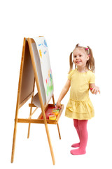 Naklejka premium A young fingers artist at drawing easel, isolated on white background