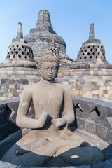 Buddha statue and stupas in Borobudur temple,  Indonesia