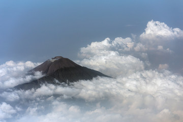 Aerial view of active smoking volcano in Java,  Indonesia