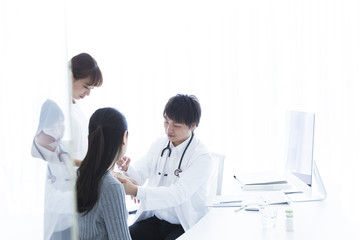 Doctors have an injection to women
