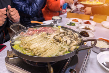 Shabu Mushrooms Sukiyaki are being cooked in pot