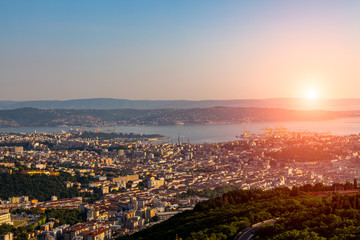 Fototapeta premium Sunset over the bay in Trieste