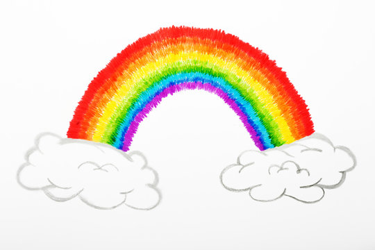 Colorful rainbow and fluffy clouds drawing, childhood conception