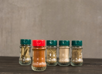 Spices and herbs in  bowls.