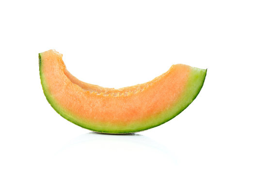 Close up of sliced cantaloupe on white background