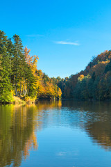 Fototapeta na wymiar Reflection of trees on Trakoscan lake in Zagorje, Croatia, season, autumn