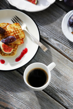 brunch pancakes with figs and coffee