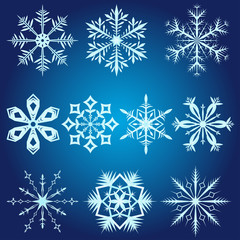 Ажурные снежинки на синем фоне - obrazy, fototapety, plakaty