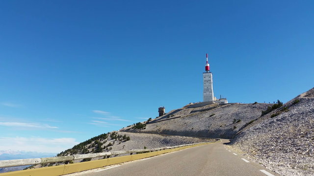 Vehicle point of view shot while driving on the road climbing the North face of the famous Mont Ventoux located in Provence in South of France.