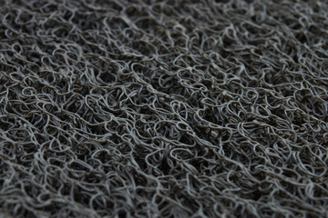 The surface of Grey car mat.