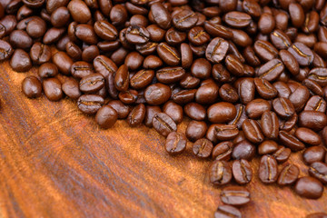Coffee bean on wood background