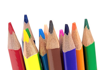 Fototapeta premium Color pencils on white background - macro image 