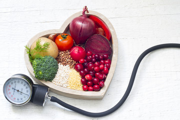 Healthy food in heart and lowering pressure sign concept
