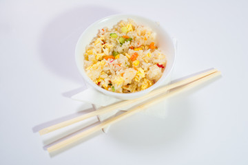 Chinese food. Rice with omelette and vegetables