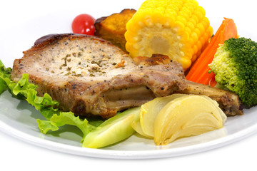 Pork steak and vegetables.
