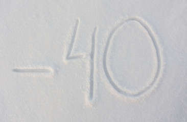 Fototapeta na wymiar The word minus forty written on snow background