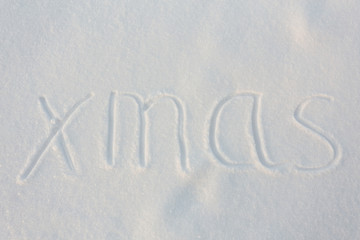 Christmas message written in the snow