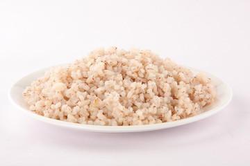 cooked red rice served in plate.Selective focus photograph,