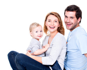 Happy young family with little child.