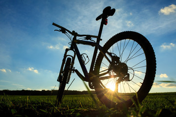 Fototapeta na wymiar Silhouette of Mountain bicycle at sunset