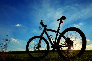 Silhouette of Mountain bicycle at sunset