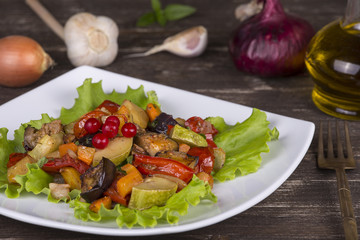 Roasted vegetables on a white plate