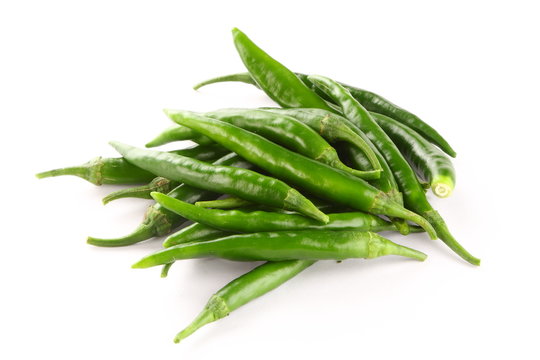Fresh green Indian peppers on white background.