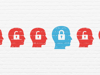 Finance concept: head with padlock icon on wall background