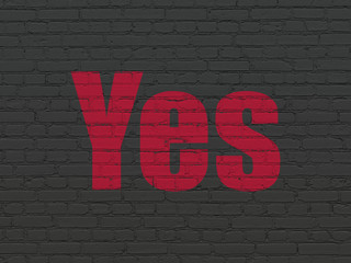 Business concept: Yes on wall background