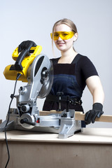 woman with a circular disk saw