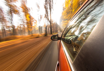 speeding car with motion blur background.