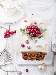 Traditional Christmas Fruit Cake pudding with marzipan and cranberry