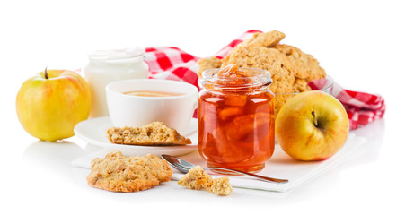 Breakfast with tea and fresh cookies. Isolated on white