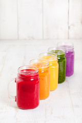 Smoothies, juices, beverages, drinks variety with fresh fruits and berries .