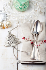 Christmas and New year table place setting with decorations. 